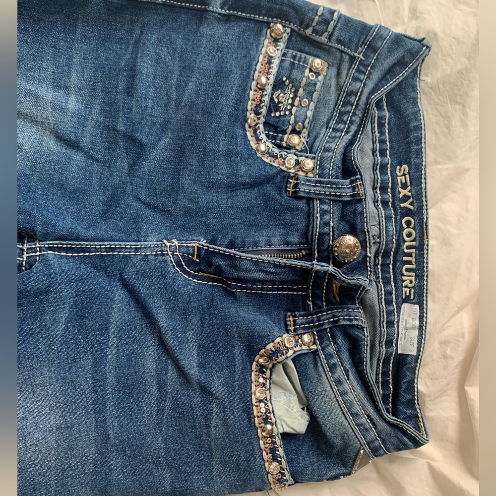 Boot cut jeans with diamonds